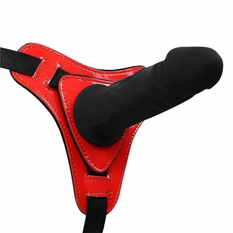 Realistischer schwarzer Umschnalldildo
